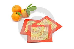 Chinese New Year mandarin oranges and red packets photo