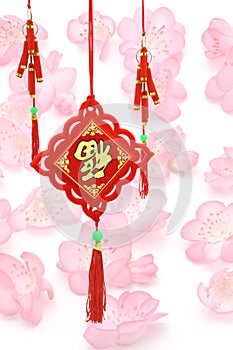 Chinese New Year ornaments on plum blossoms backg