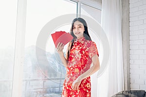 Chinese New Year of Portrait Beauty Asian Woman with Chinese dress,Qipao,Cheongsam