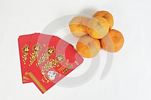 Chinese New Year Red Packet and mandarin oranges