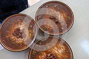 Chinese noodle with beef in spicy soup