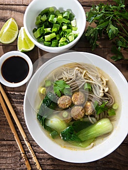 Chinese noodle soup with Chinese sausages and Japanese mushrooms