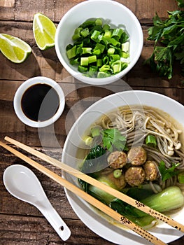 Chinese noodle soup with Chinese sausages and Japanese mushrooms