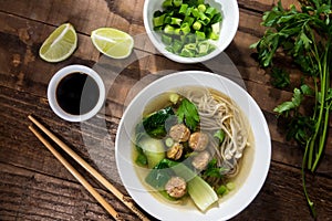 Chinese noodle soup with Chinese sausages and Japanese mushrooms