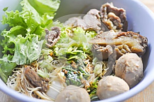 Chinese noodle with vegetable , meatball and beef