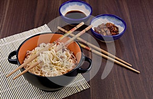 Chinese noodles in bowl stock images