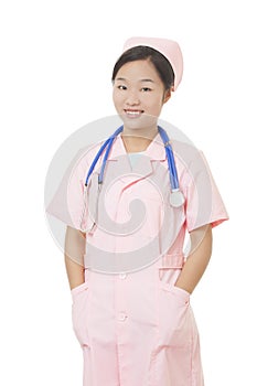 Portrait of a beautiful Asian nurse with a stethoscope isolated on white background photo