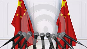 Chinese official press conference. Flags of China and microphones. Conceptual animation