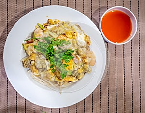 Chinese oyster omelette with chilli sauce