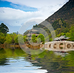 Chinese pagoda reflecting in the lake