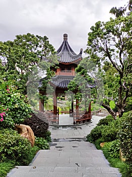 Chinese pagoda pavilion among the trees in Asian style park