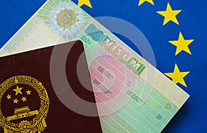 Chinese Passport on european flag schengen visa