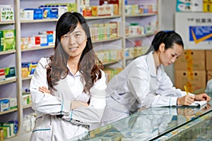 Chinese pharmacy worker in china drugstore
