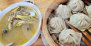 Chinese pork bun and black chicken soup.