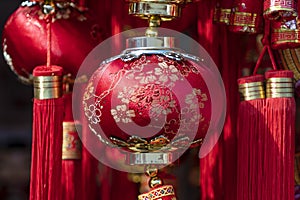Chinese red and gold lantern display on Chinese New year festival on the street in Singapore, closeup