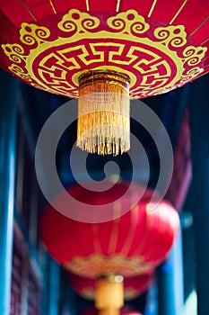Chinese red lantern with yellow and golden pattern