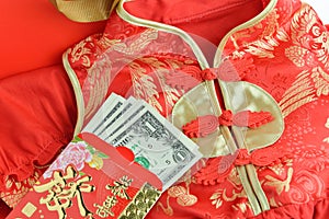 Chinese Red Packet and Qipao Traditional chinese dress or mandarin gown , lucky money packet. Chinese New Year