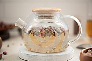 chinese rosebud tea in glass teapot