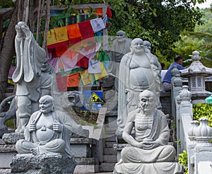 Chinese sculpture in the garden  in Nanshan Buddhist Cultural Centre