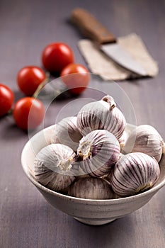 Chinese solo garlic on wooden background