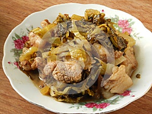 Chinese sour salted vegetable and pork stew