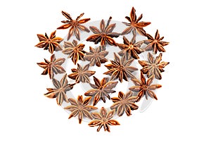 Chinese Star Anise, Star Anise, Star Aniseed, Badiane, Badian, Badian Khatai, Bunga Lawang, Thakolam, arranged in a heart shape.