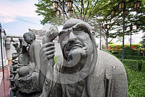 Chinese statue in the Buddhist garden temple.