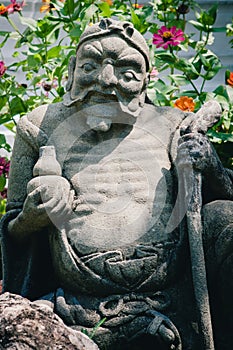 Chinese statue at the the Wat Phra Kaew Palace, also known as the Emerald Buddha Temple. Bangkok, Thailand.