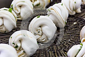 Chinese steamed bread making,kitchen of a chinese restaurant