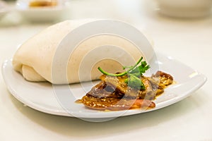 Chinese steamed bun and Barbecued red pork white sauce