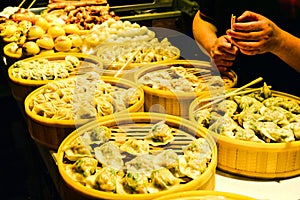 Chinese Steamed Dumplings in Bamboo Steamers