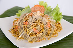 Chinese stir fried noodles with chicken photo