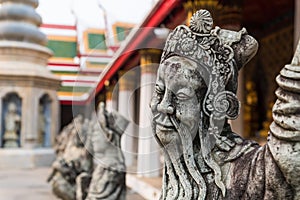 The Chinese stone sculptures decorated in Wat Arun Ratchawararam, Bangkok, Thailand