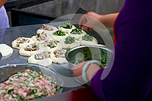 Chinese street food, baozi with onions and meat