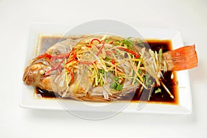 Chinese style marinated steamed fish