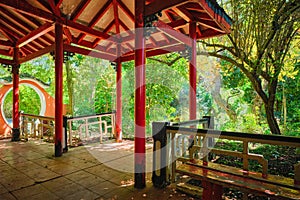 Chinese style pavilion in asian part of tropical botanical garden in Lisbon, Portugal