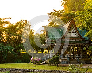 Chinese style pavilion and Tree of a park in Thailand