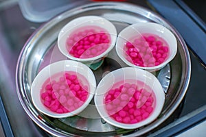 Chinese sweets dumpling from sticky rice, in syrup for serve wedding guest in wedding ceremony.