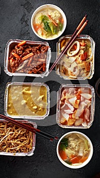 Chinese takeaway food. Pork Wonton dumpling soup, Crispy shredded beef, sweet and sour pineapple chicken, egg noodles