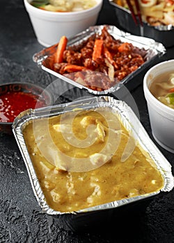 Chinese takeaway food. Pork Wonton dumpling soup, Crispy shredded beef, sweet and sour pineapple chicken, egg noodles
