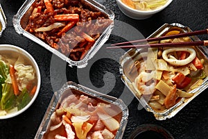 Chinese takeaway food. Pork Wonton dumpling soup, Crispy shredded beef, sweet and sour pineapple chicken, egg noodles