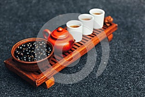 Chinese tea ceremony Asian wooden table board chaban top view copy space morning energy.