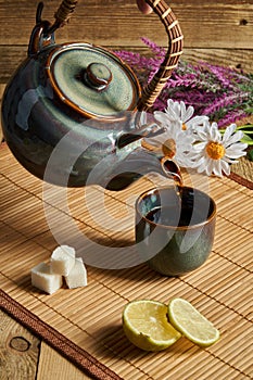Chinese tea party. Teapot and a cups for tea