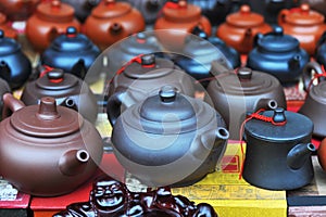 Chinese teapots and buddha