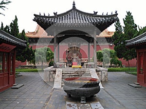 Chinese Temple with a God and an Incense Burner