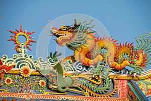 Chinese temple pagoda decoration with dragon statue