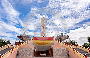 Chinese temple in Thailand under the blue sky and big cloud (