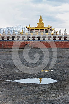 Chinese temple under snow mountain