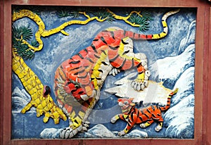 Chinese temple wall detail tigers