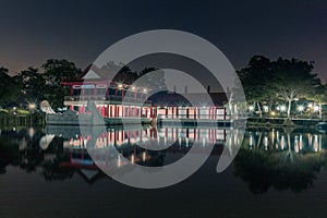 Chinese temples reflecting in the lake in the Chinese garden in